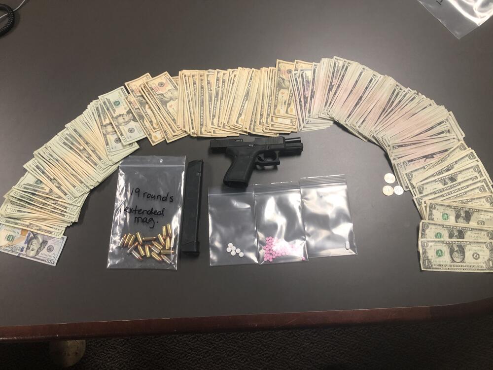 Money, drugs, and firearm