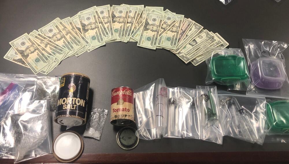 Image of drugs and cash. 