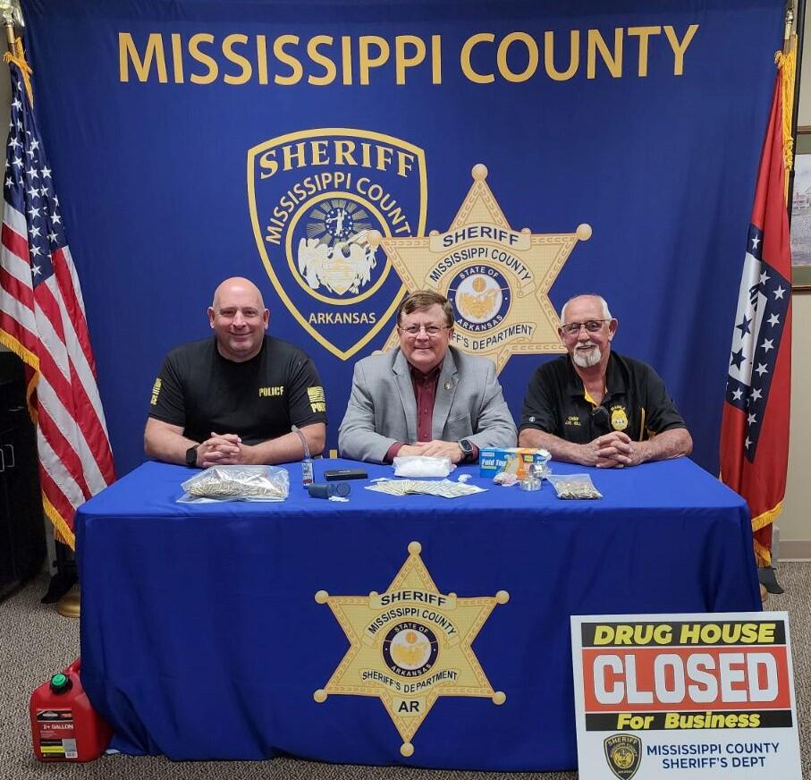Chief Austin, Sheriff Cook, and Chief Hill pose for picture. 