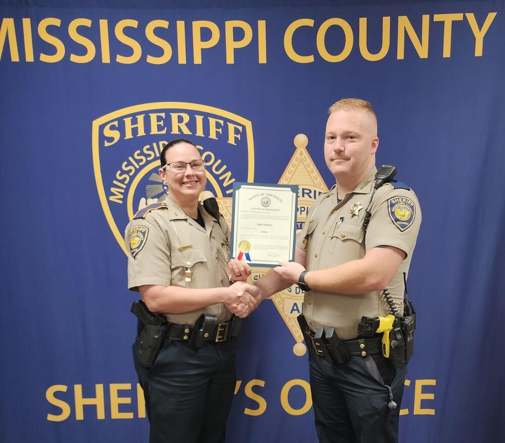 Deputy Vandyke and Sergeant Teeter pose for photo.