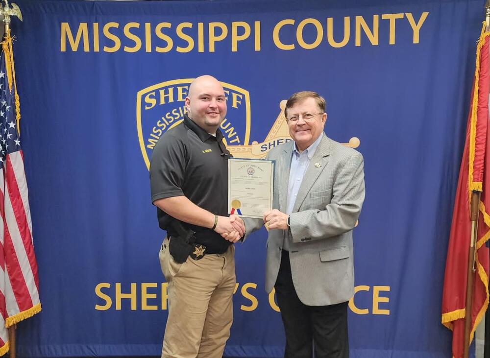 Lt. Austin Griffin and Sheriff Cook pose for photo.