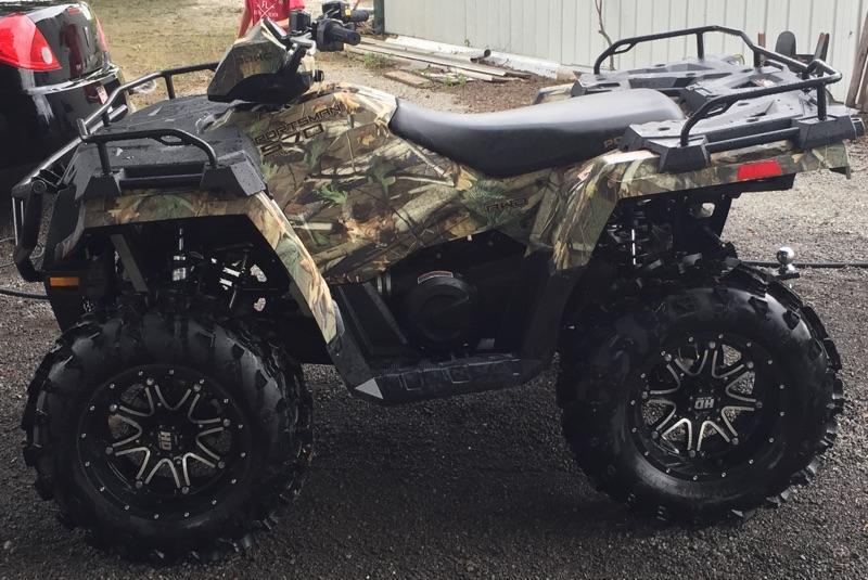 Side view of stolen 4 wheeler.