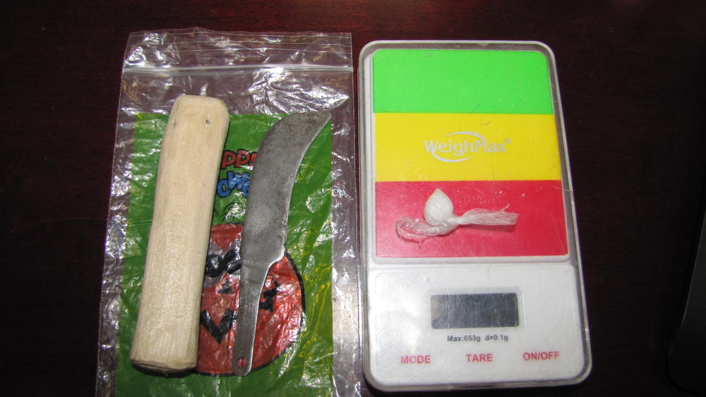 Image of drugs and scales. 