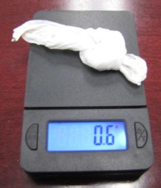 Image of drugs on scales. 