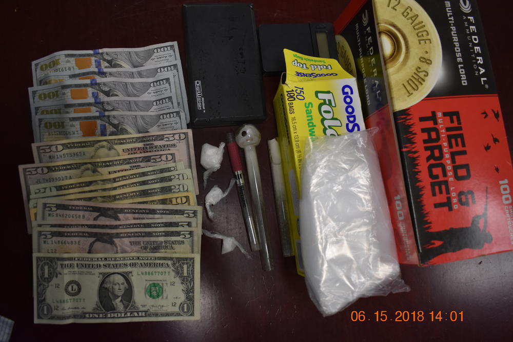 Image of drugs and cash. 