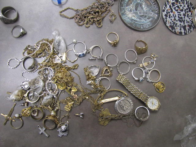 Several gold bracelets.