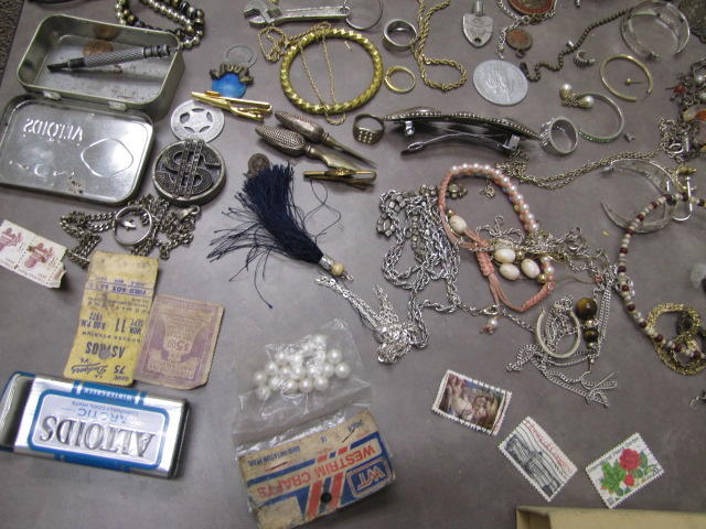 Several bracelets and necklaces.