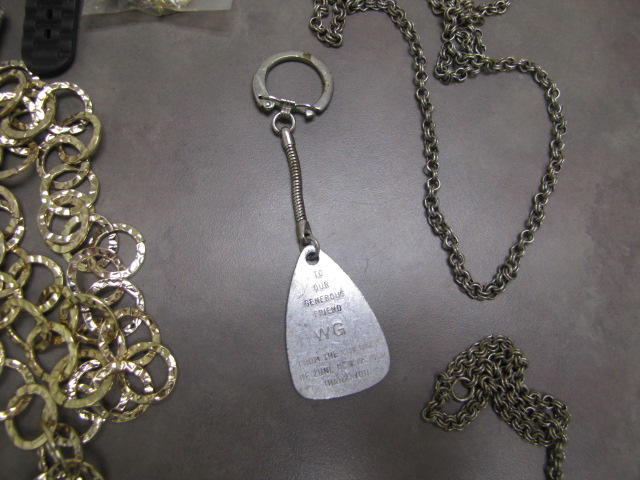 Photo of personalized silver keychain.