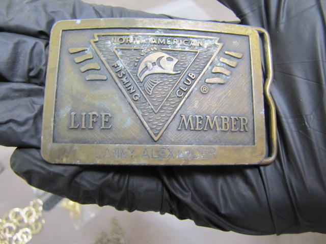 Close up photo of belt buckle.