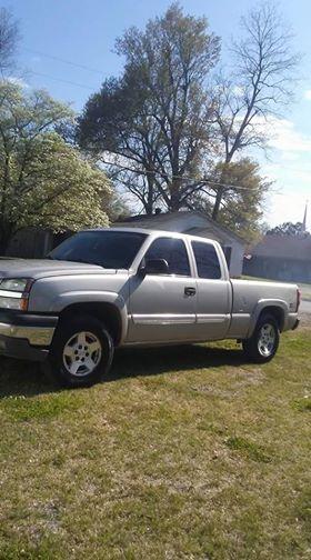 Silver pickup truck.