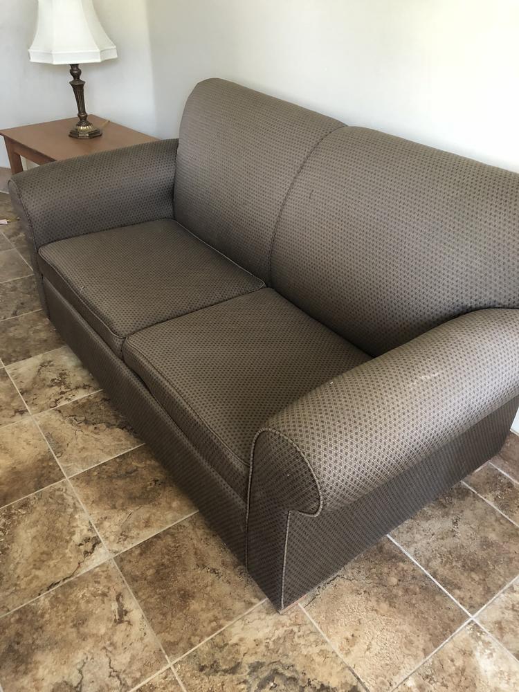 Photo of a gray couch.