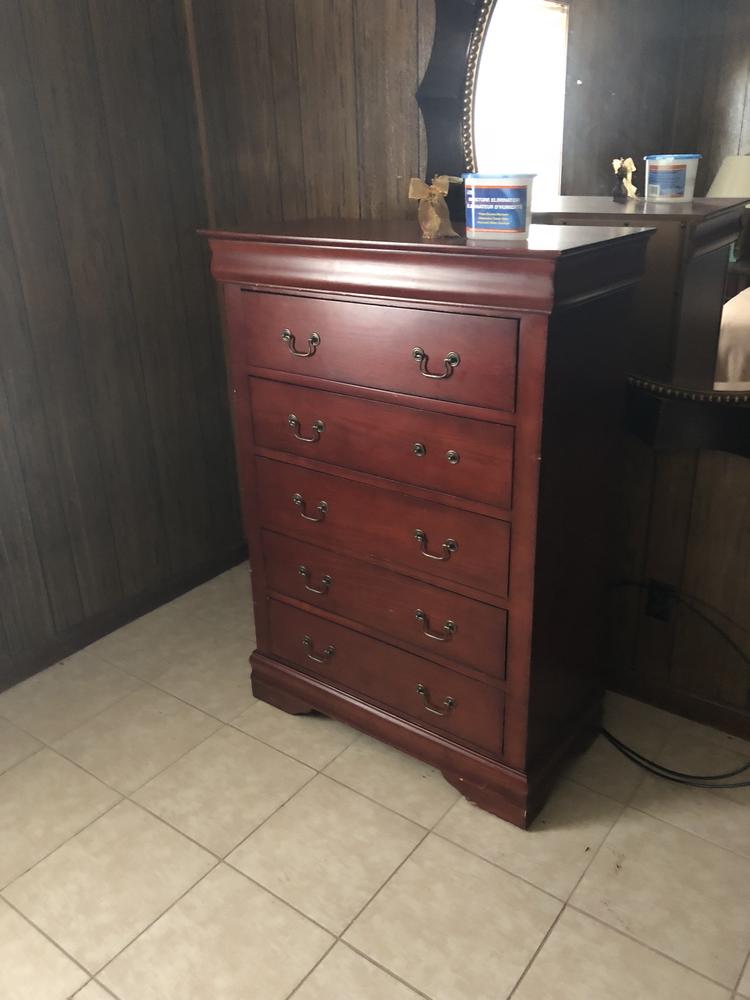 Photo of a brown dresser.