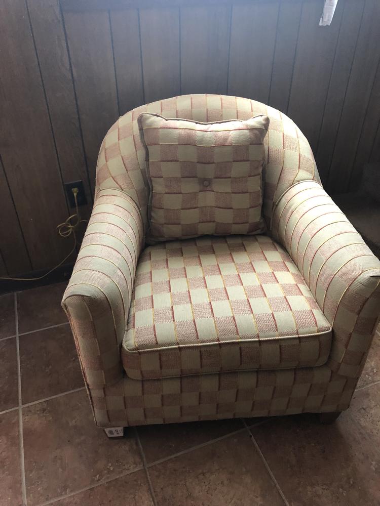 Photo of a tan checkered chair.