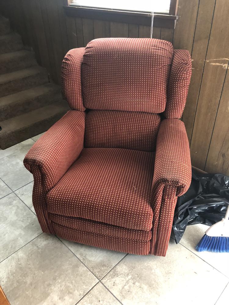 Photo of a red rocking chair.