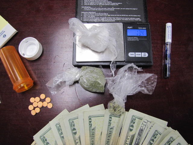 Image of drugs and scales. 