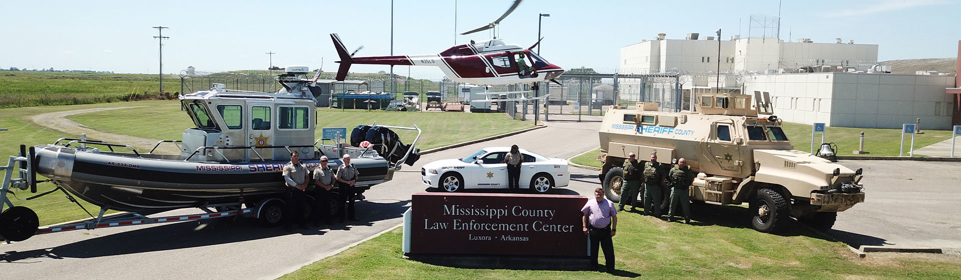 Mississippi County law enforcement divisions posing together outside of the Law Enforcement Center in Luxora, Arkansas