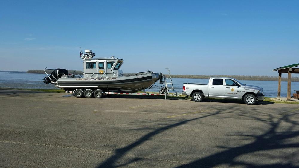 Marine Patrol truck towing their Marine Patrol boat